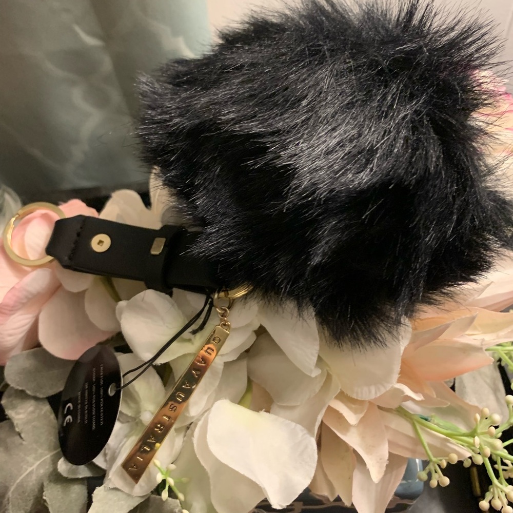New Quay Australia Kylie Jenner Black Gold Pom-Pom Keychain Strap